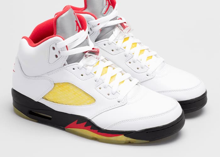 The @Philllllthy “Aged” Fire Red Air Jordan 5s. Only on DropX.